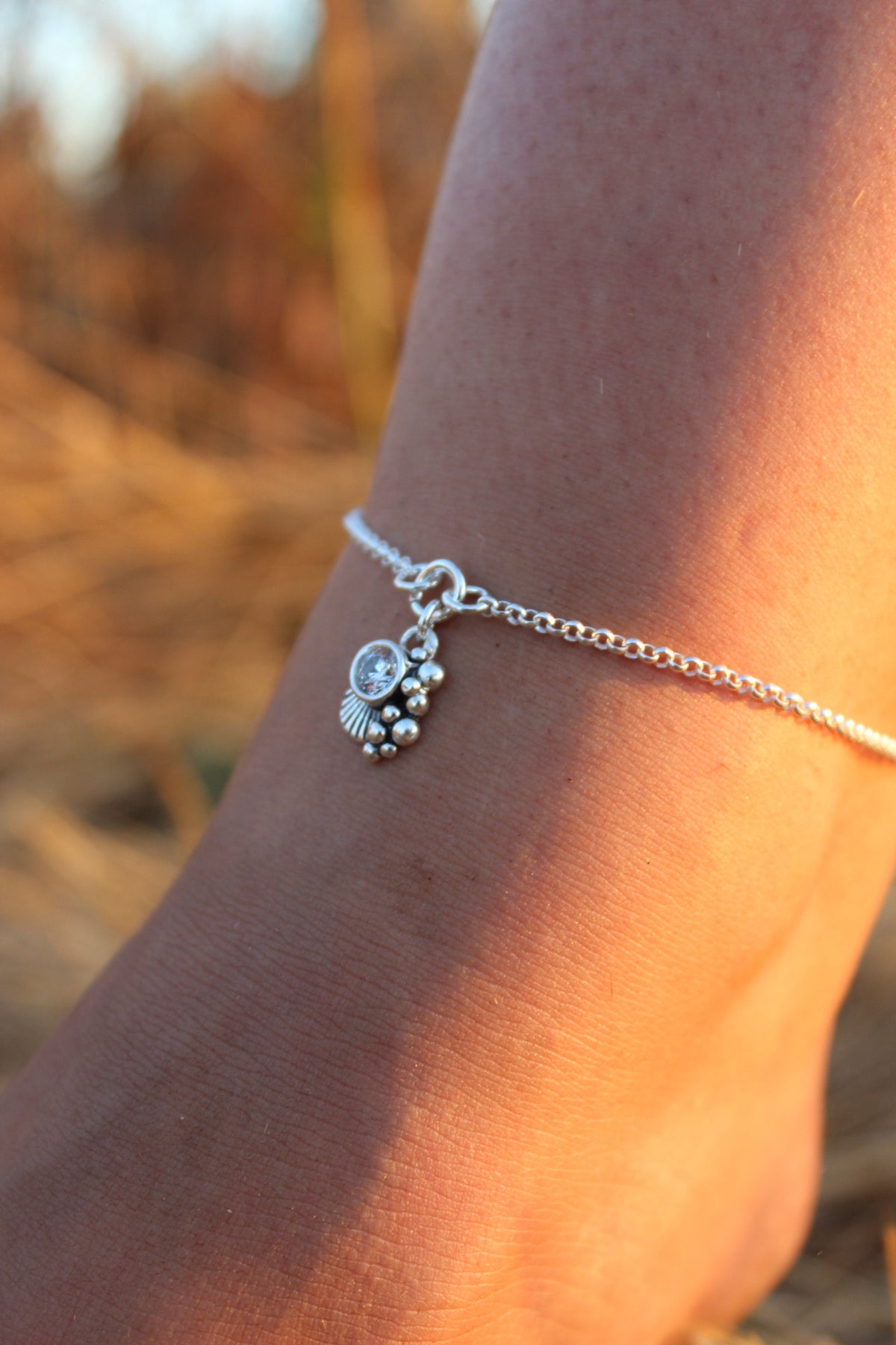 Tobillera concha cristal