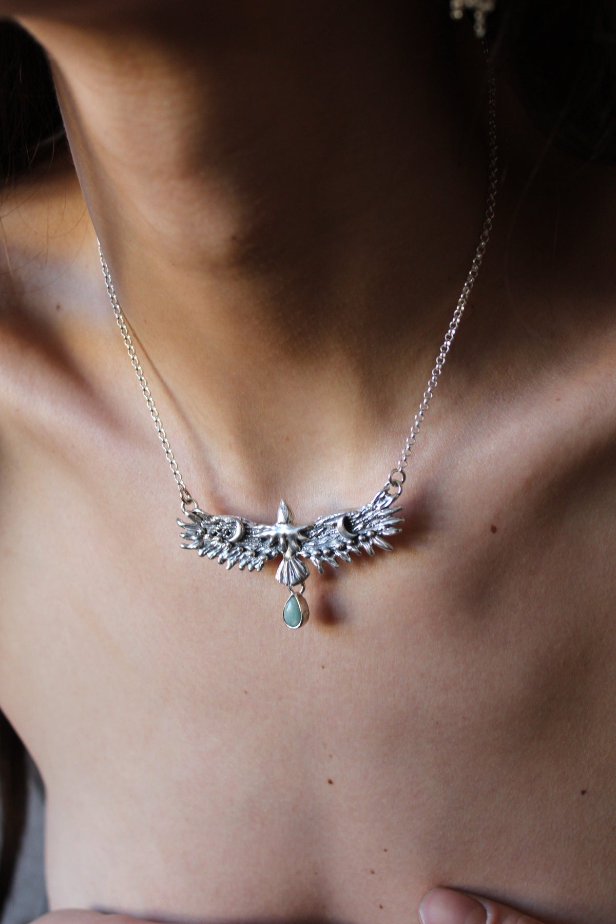 Collar águila guía