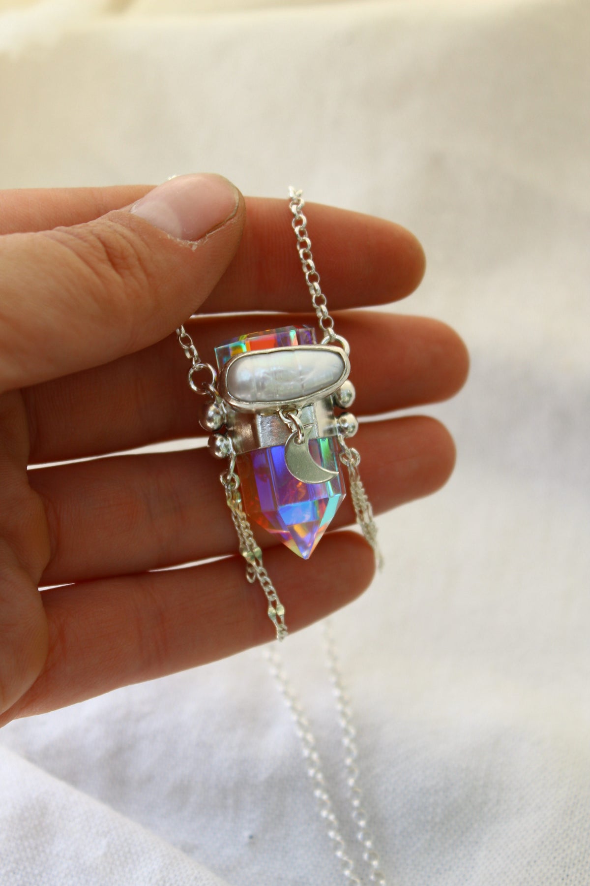 Amuleto místico perla