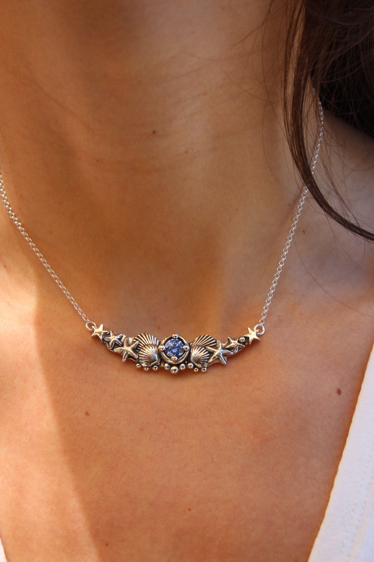 Collar hermandad cristal azul