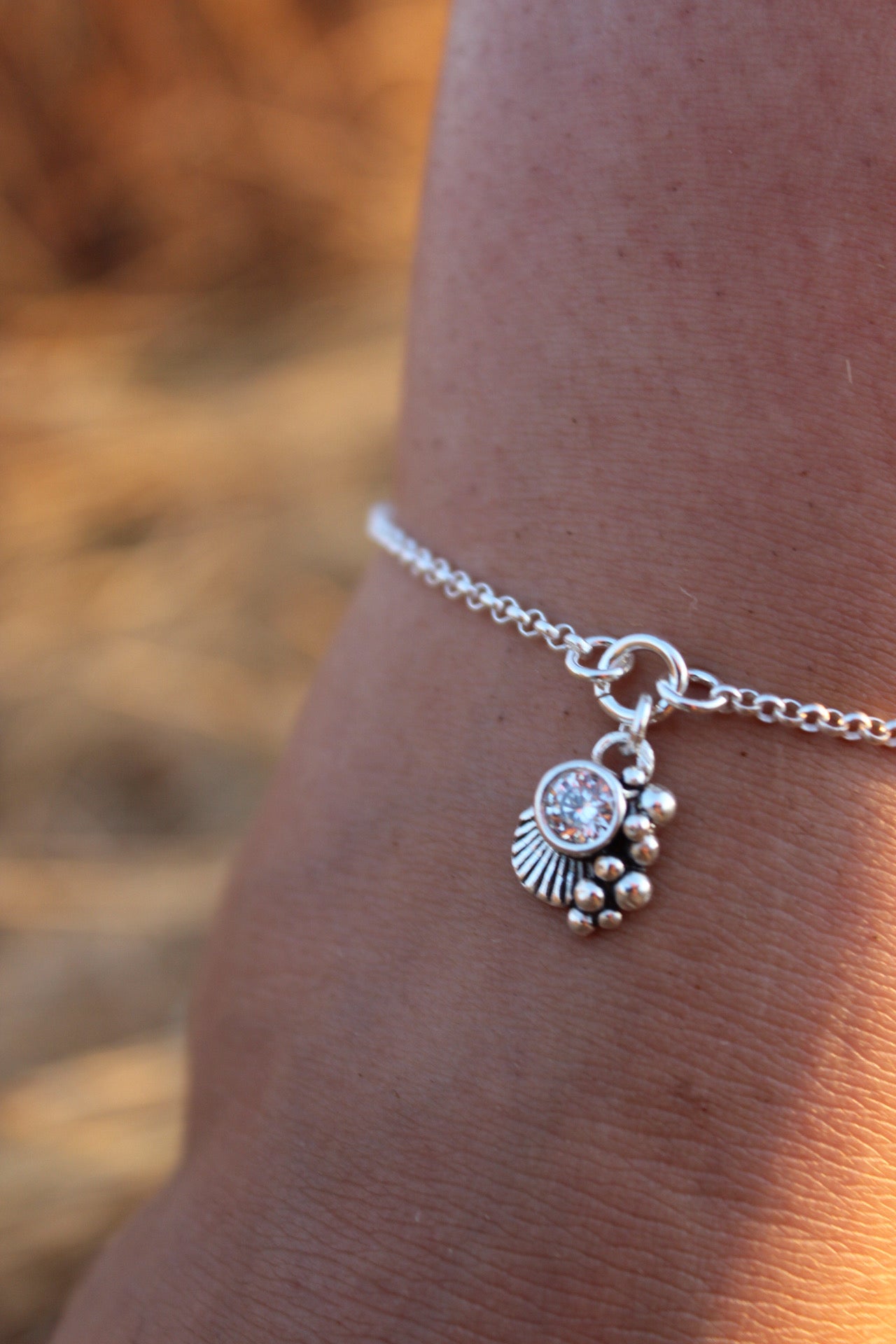 Tobillera concha cristal