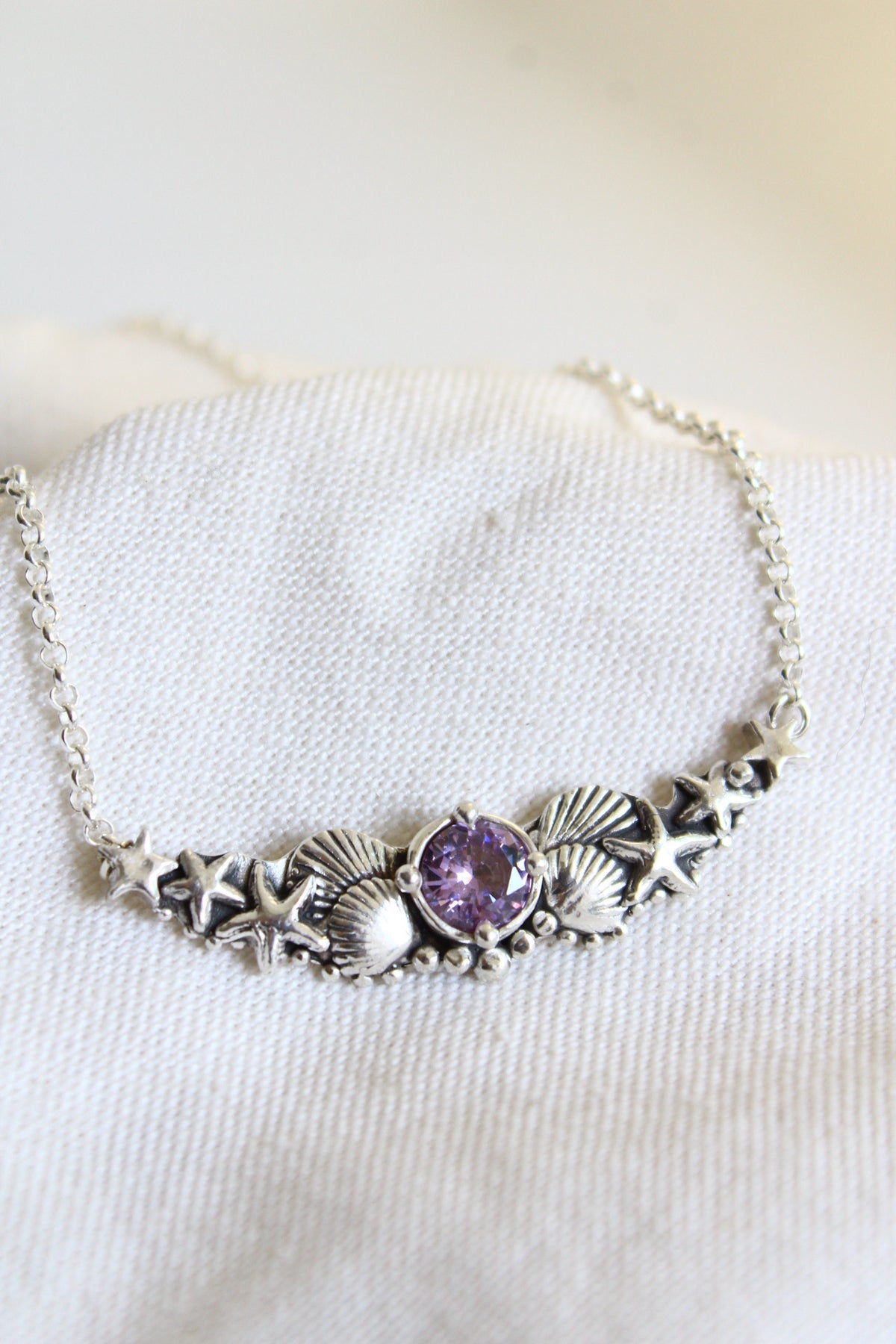 Collar hermandad cristal morado