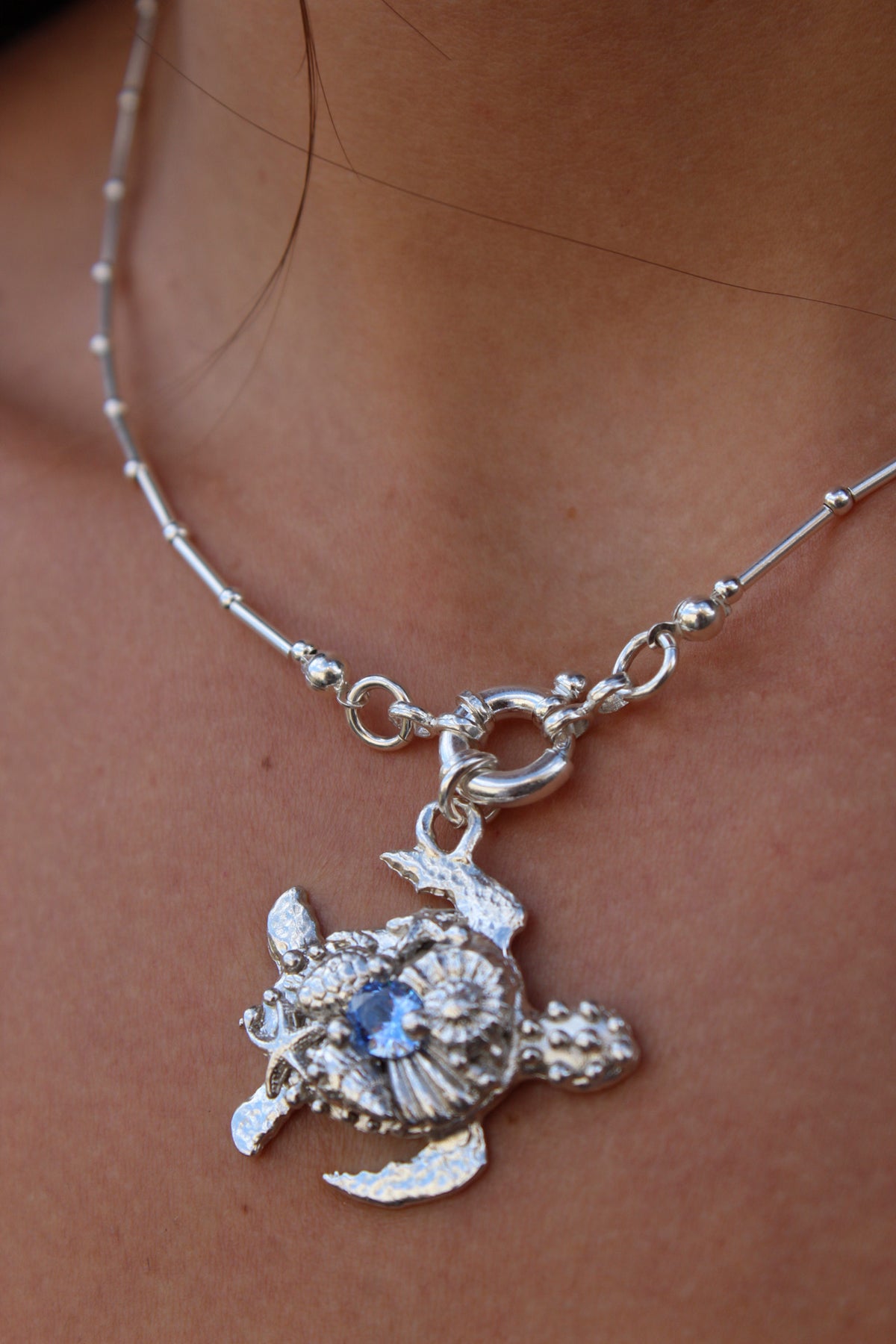 Tortu mommy con cristal azul