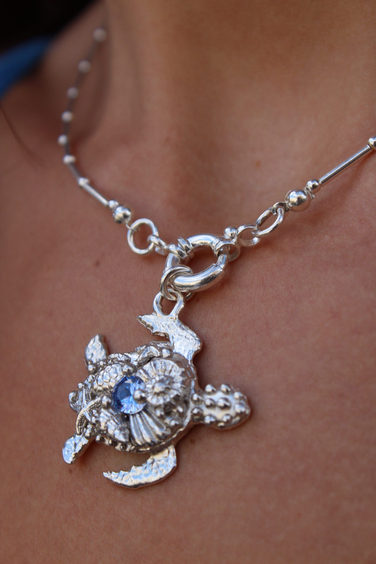 Tortu mommy con cristal azul