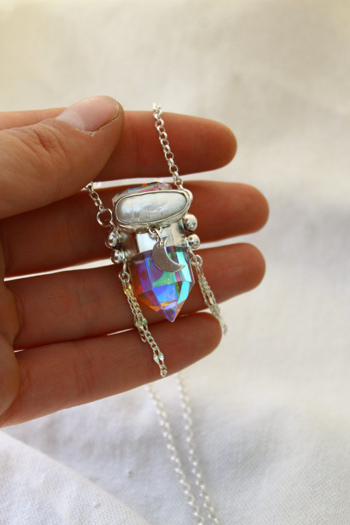 Amuleto místico perla