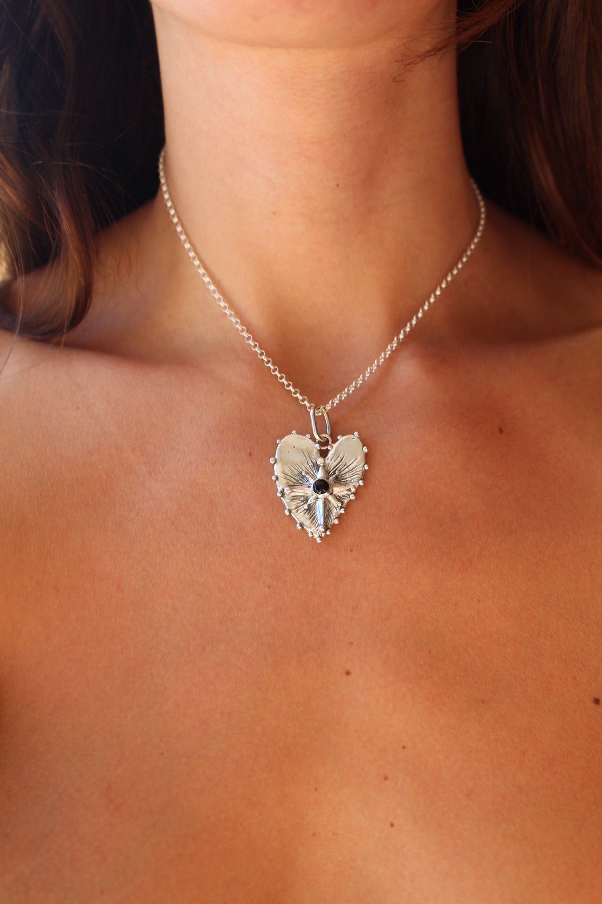 Corazón guía ónix negro