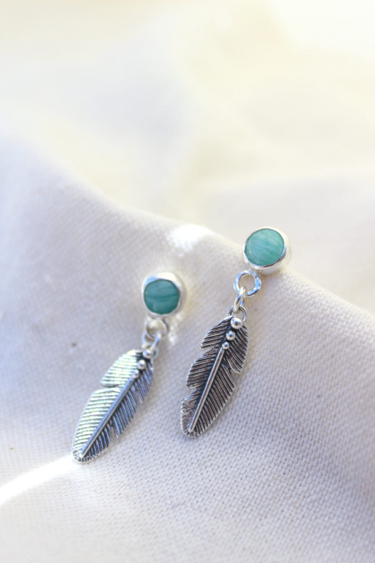 Conjunto collar águila sagrada + aros pluma Amazonita