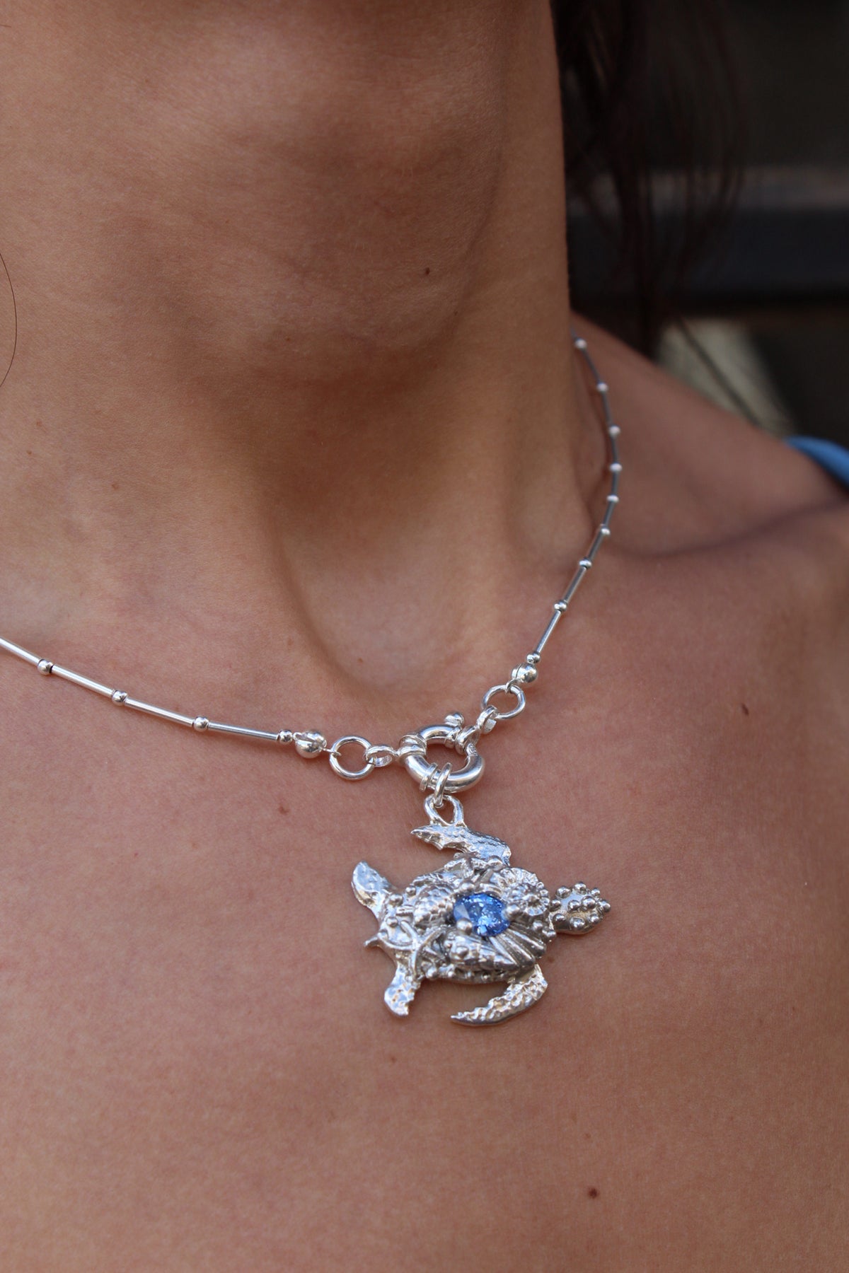 Tortu mommy con cristal azul