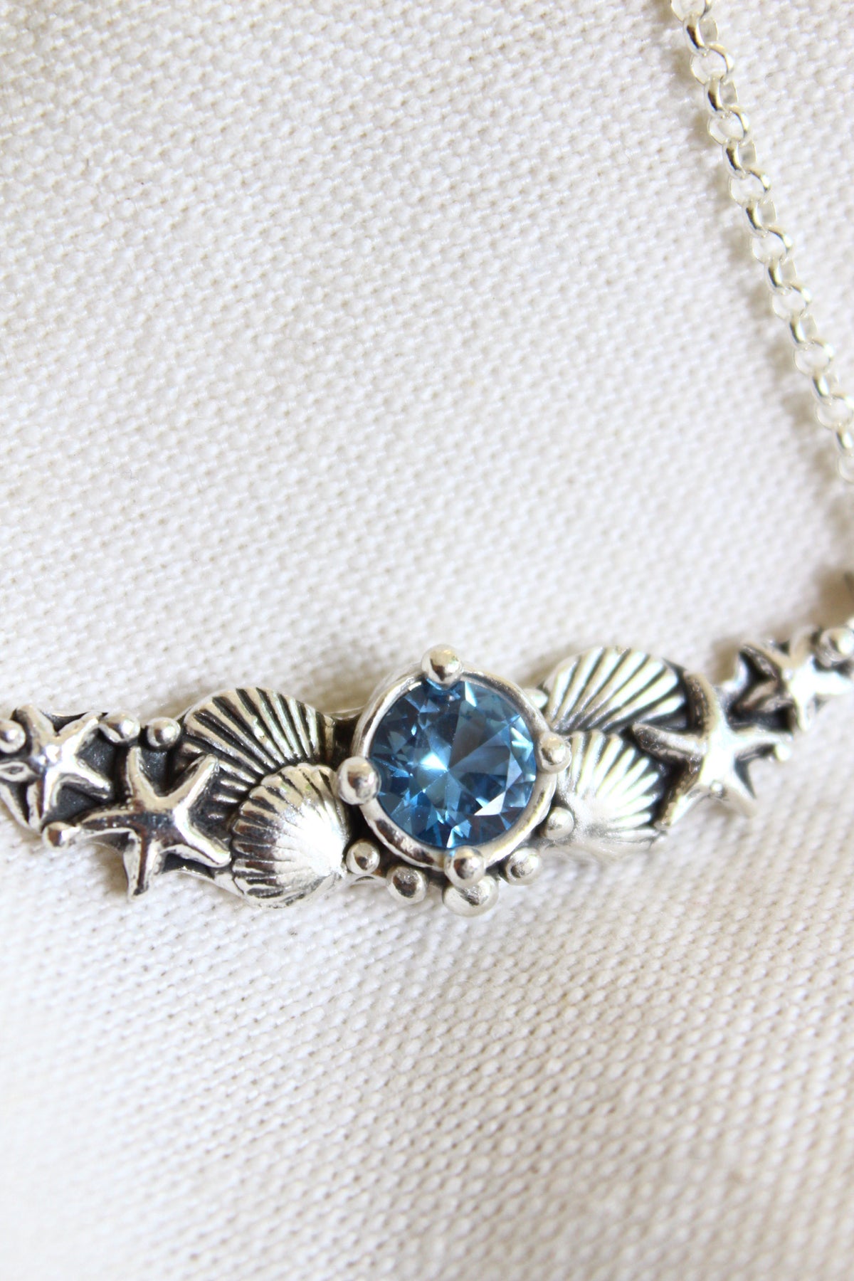 Collar hermandad cristal azul