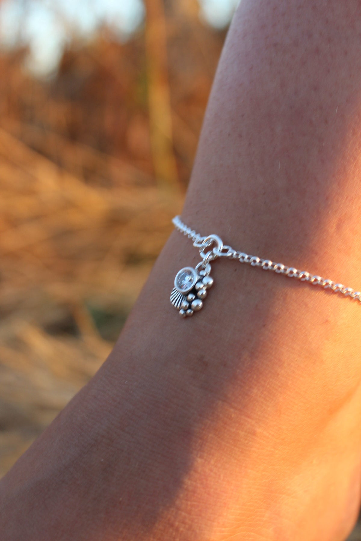 Tobillera concha cristal