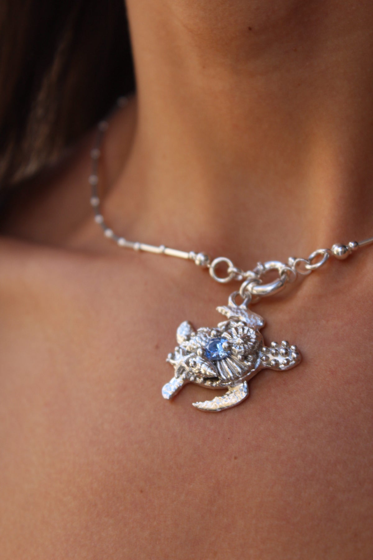 Tortu mommy con cristal azul