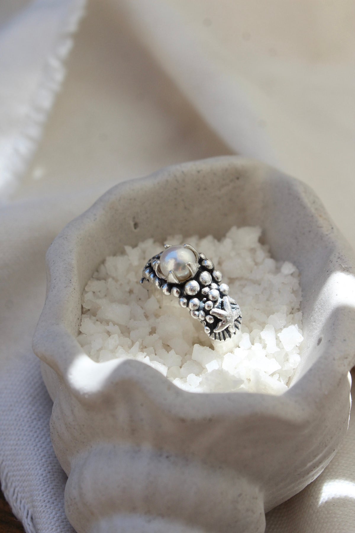 Anillo “LA PERLA” estrella