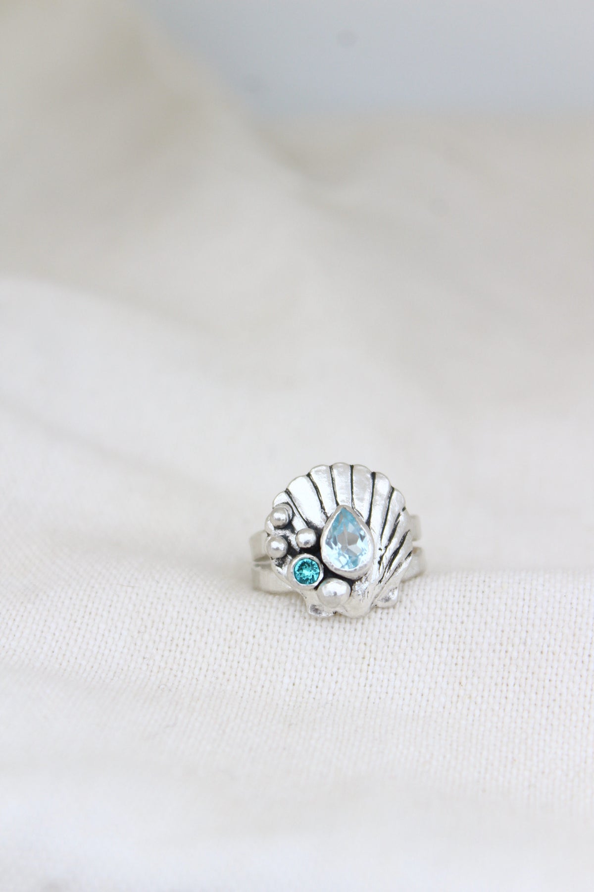 Anillo concha aguamarina