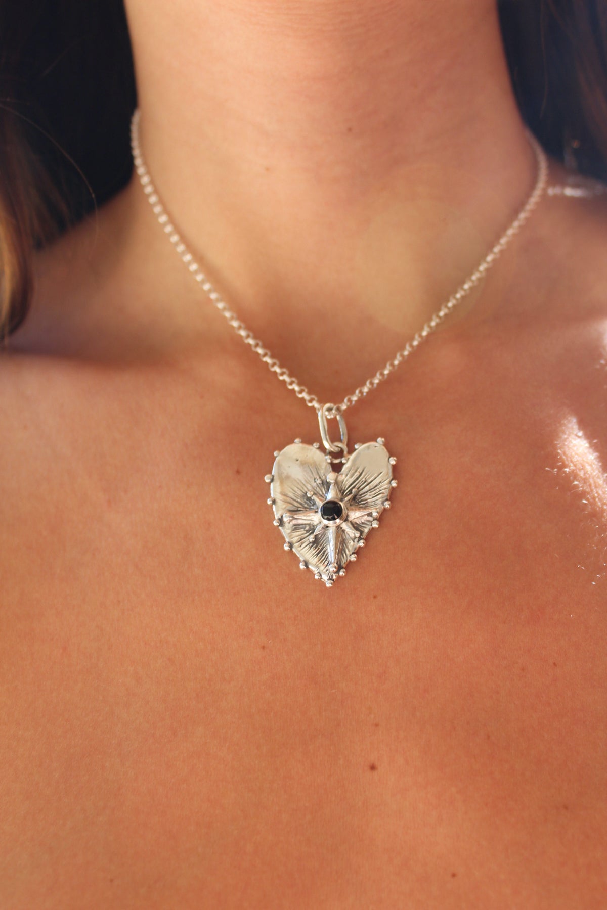 Corazón guía ónix negro