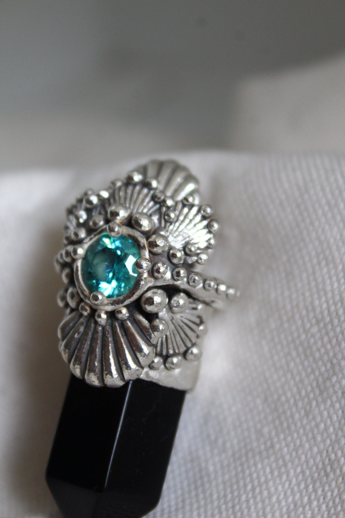 Amuleto conchas ónix negro