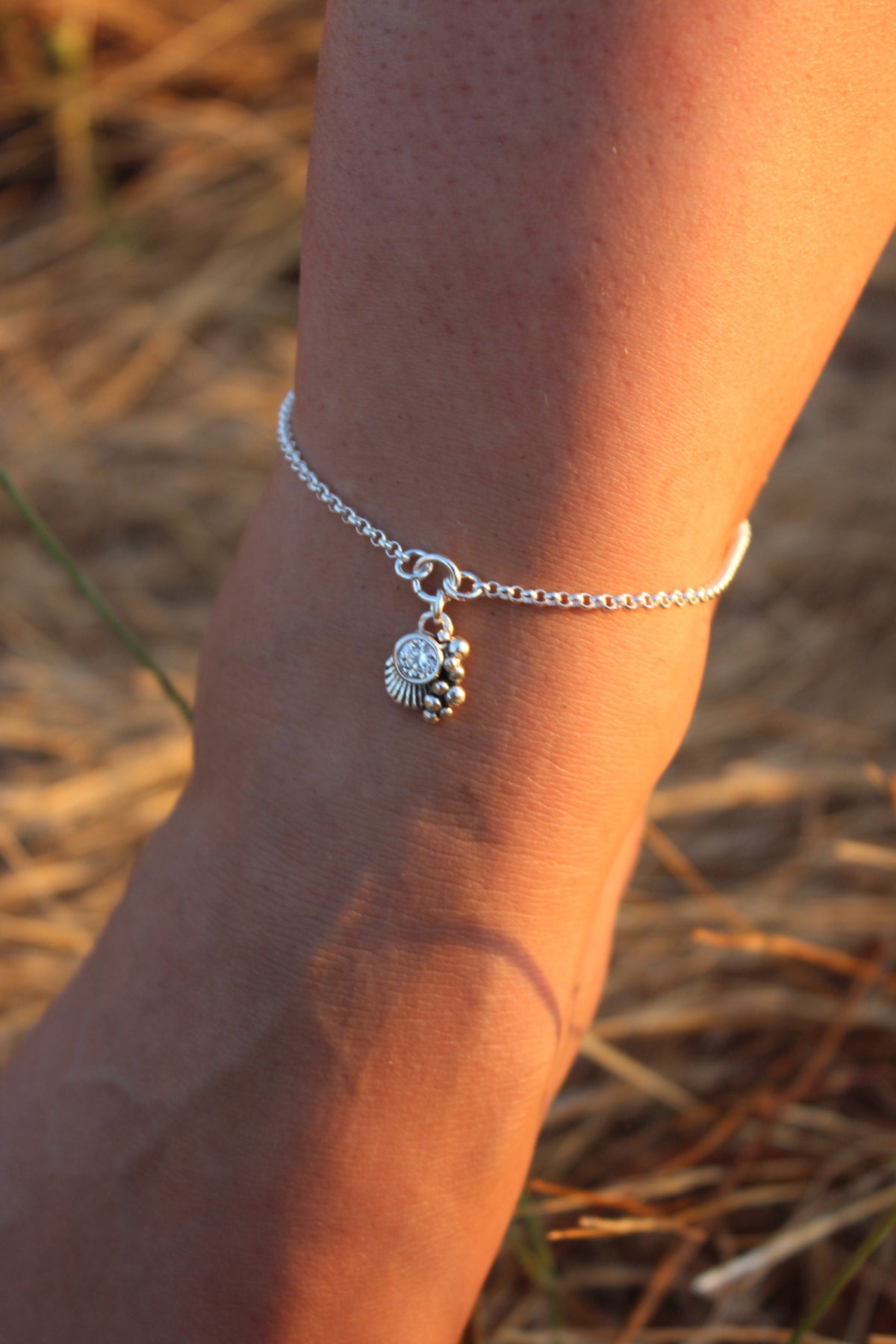 Tobillera concha cristal