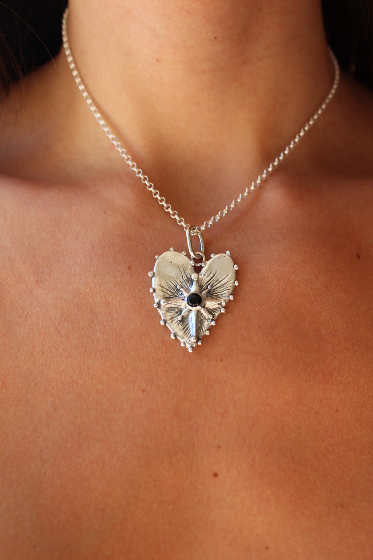 Corazón guía ónix negro