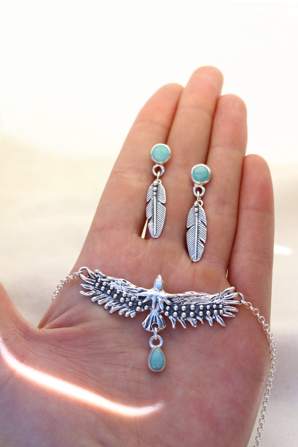 Conjunto collar águila sagrada + aros pluma Amazonita