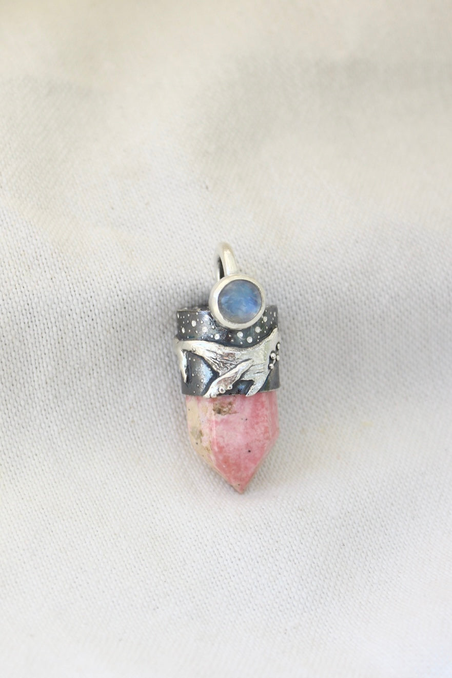 Amuleto ballena rosa