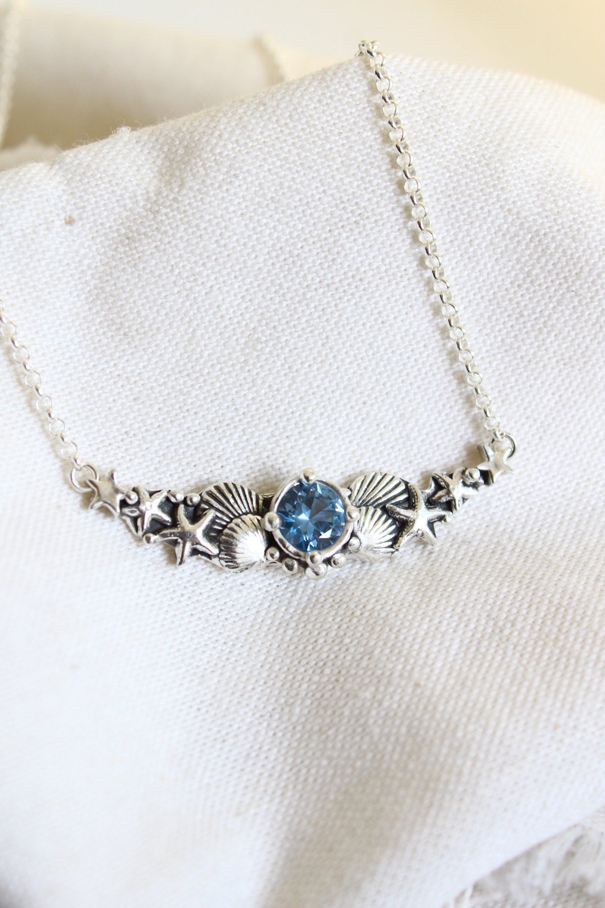 Collar hermandad cristal azul