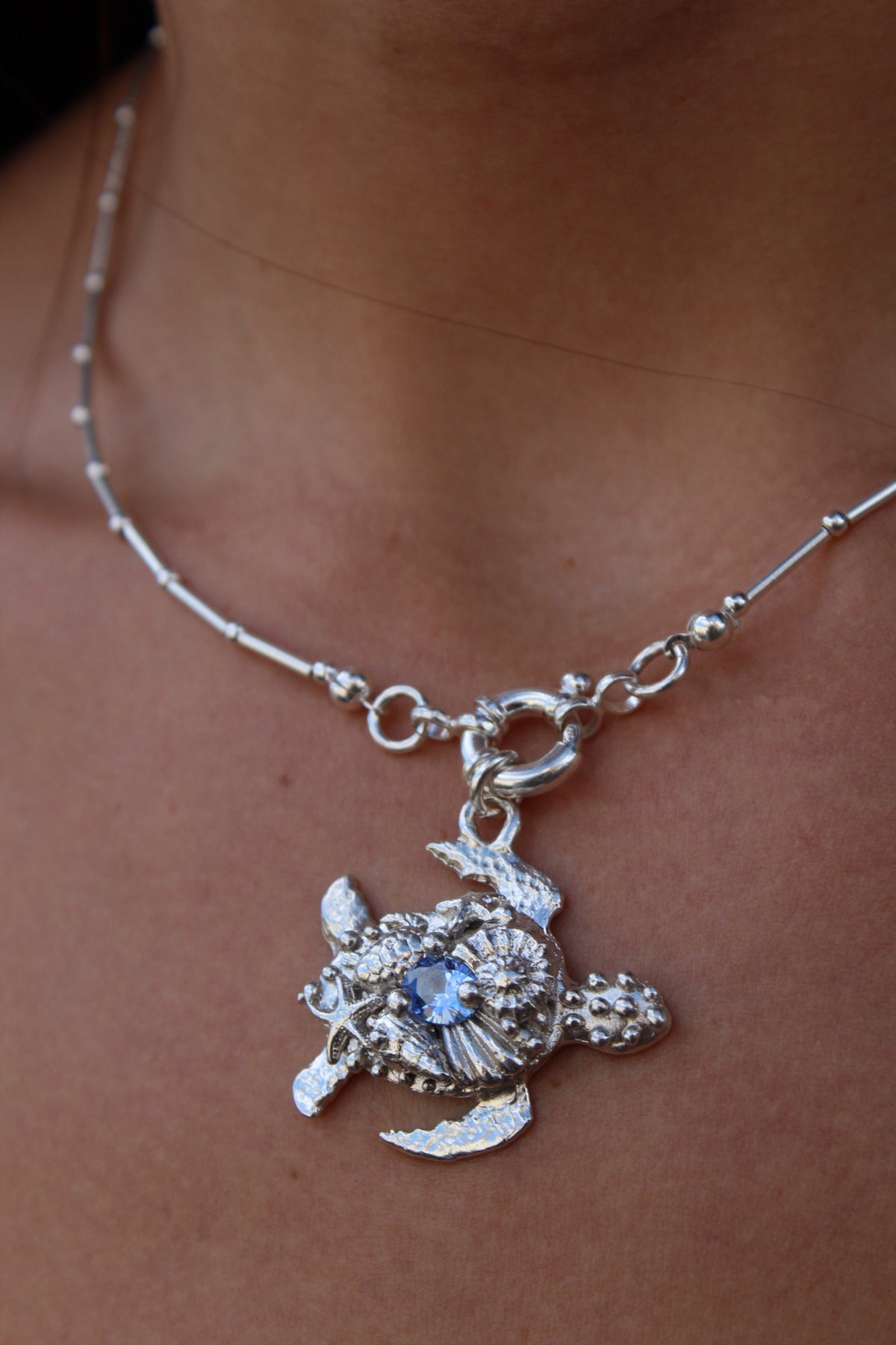 Tortu mommy con cristal azul