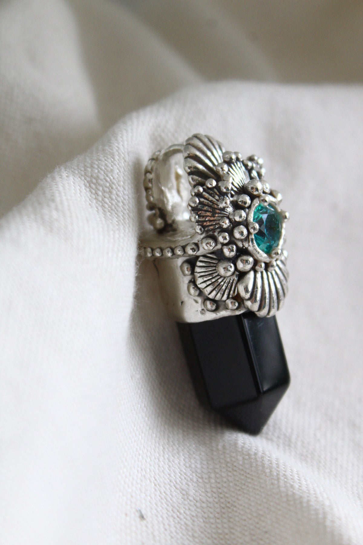 Amuleto conchas ónix negro