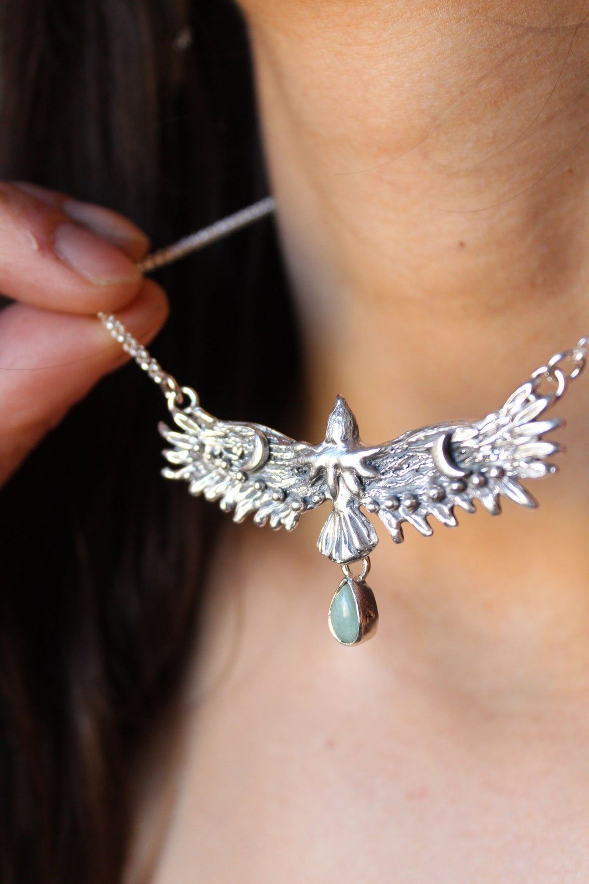 Collar águila guía