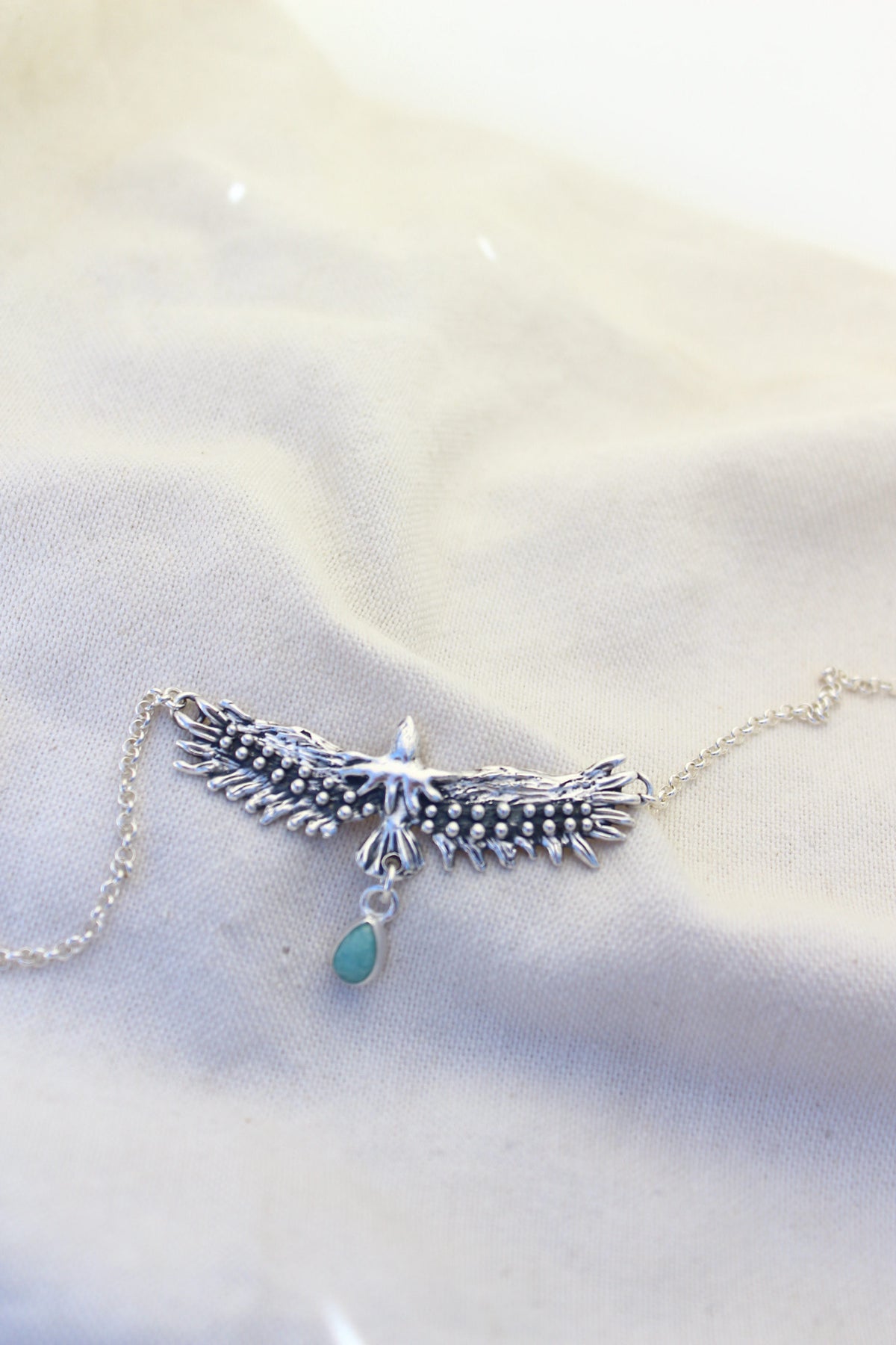 Conjunto collar águila sagrada + aros pluma Amazonita