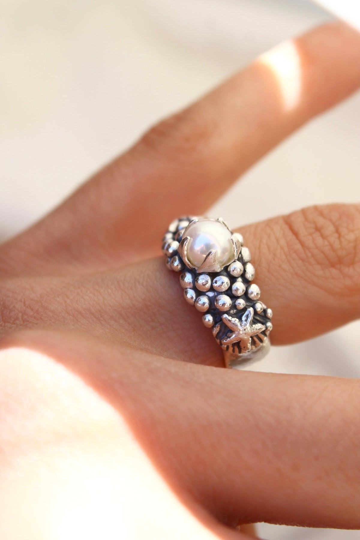 Anillo “LA PERLA” estrella