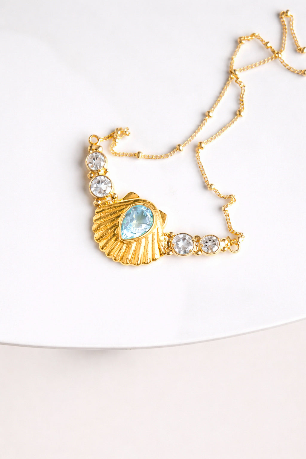 COLLAR CONMIISANKA GOLD DE TOPACIO BLANCO Y CELESTE