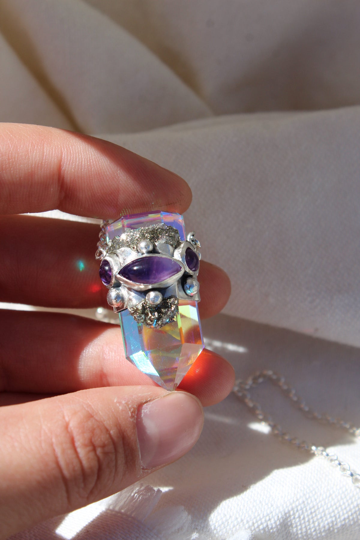 Amuleto ojo místico en amatista