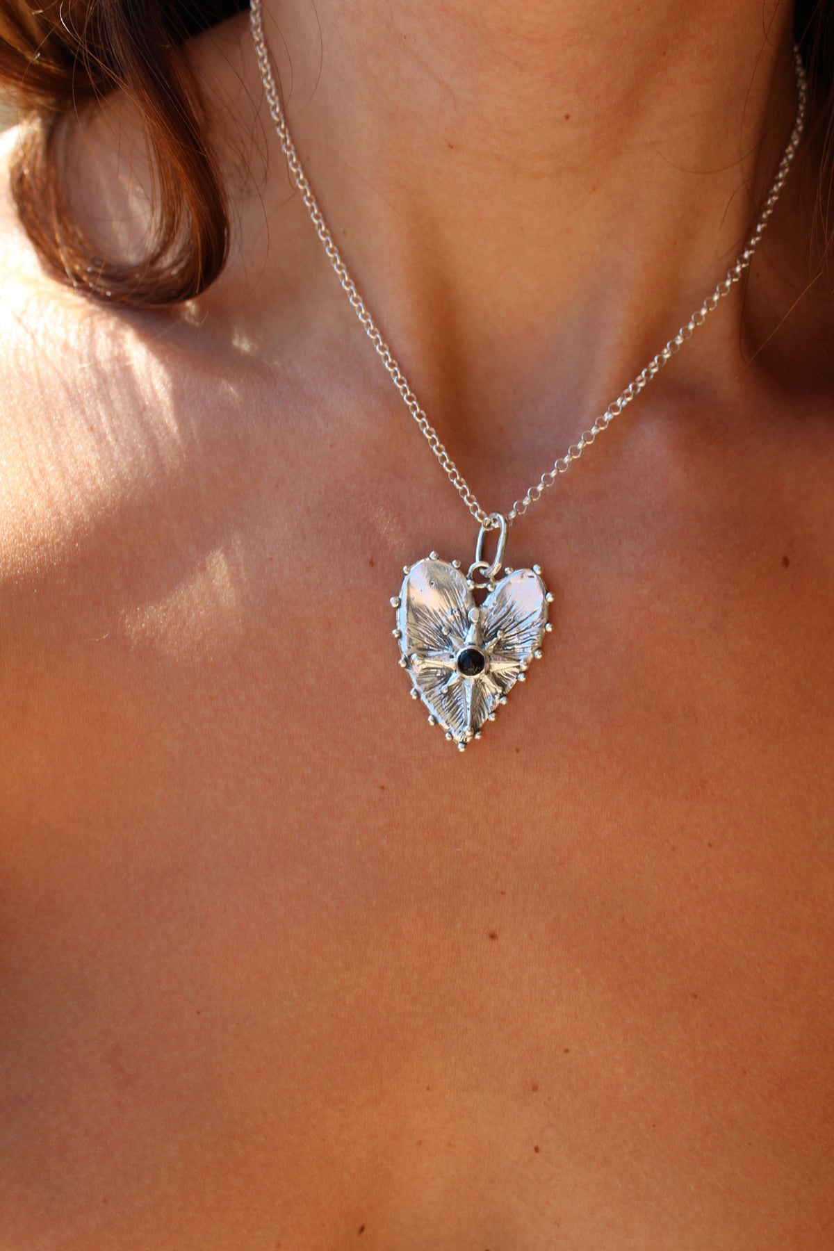 Corazón guía ónix negro