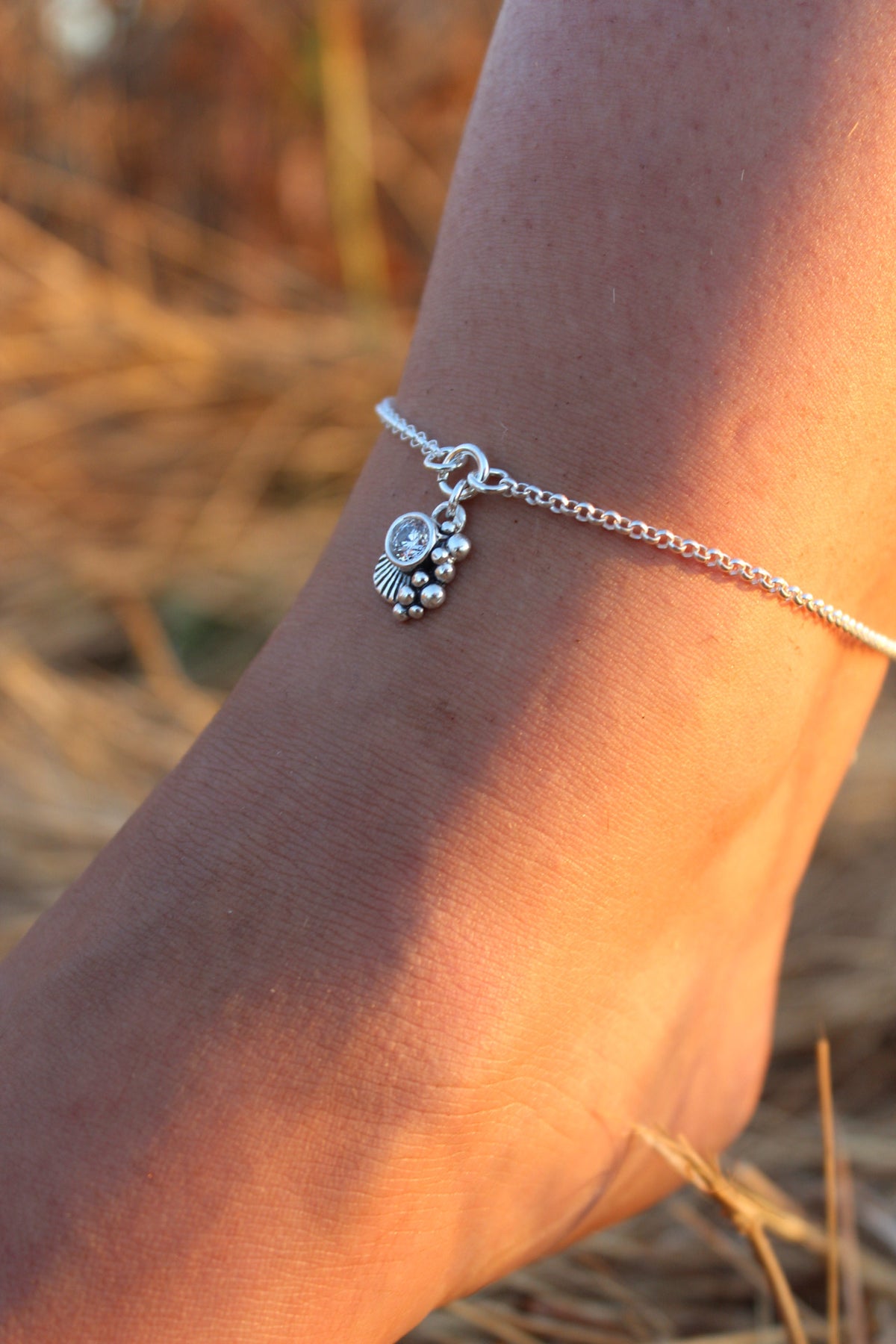 Tobillera concha cristal