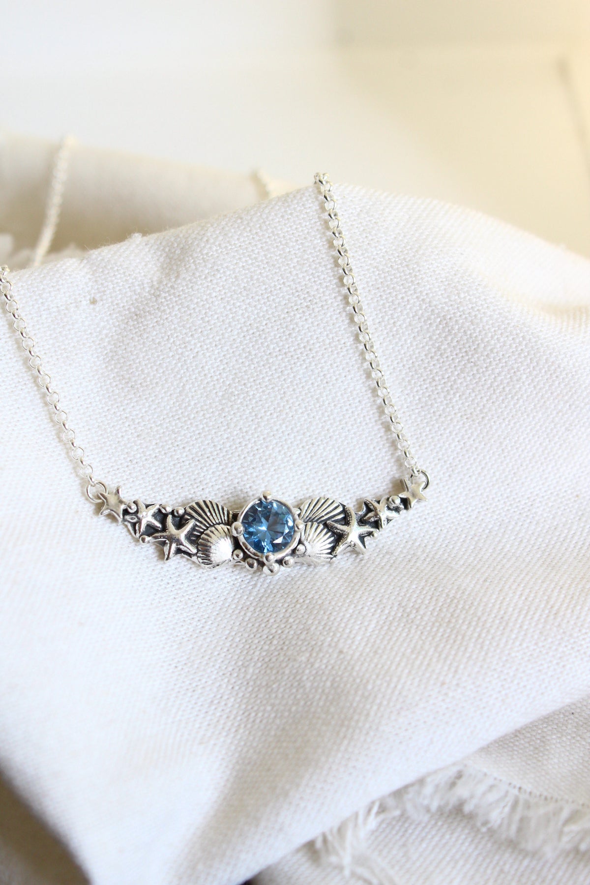 Collar hermandad cristal azul