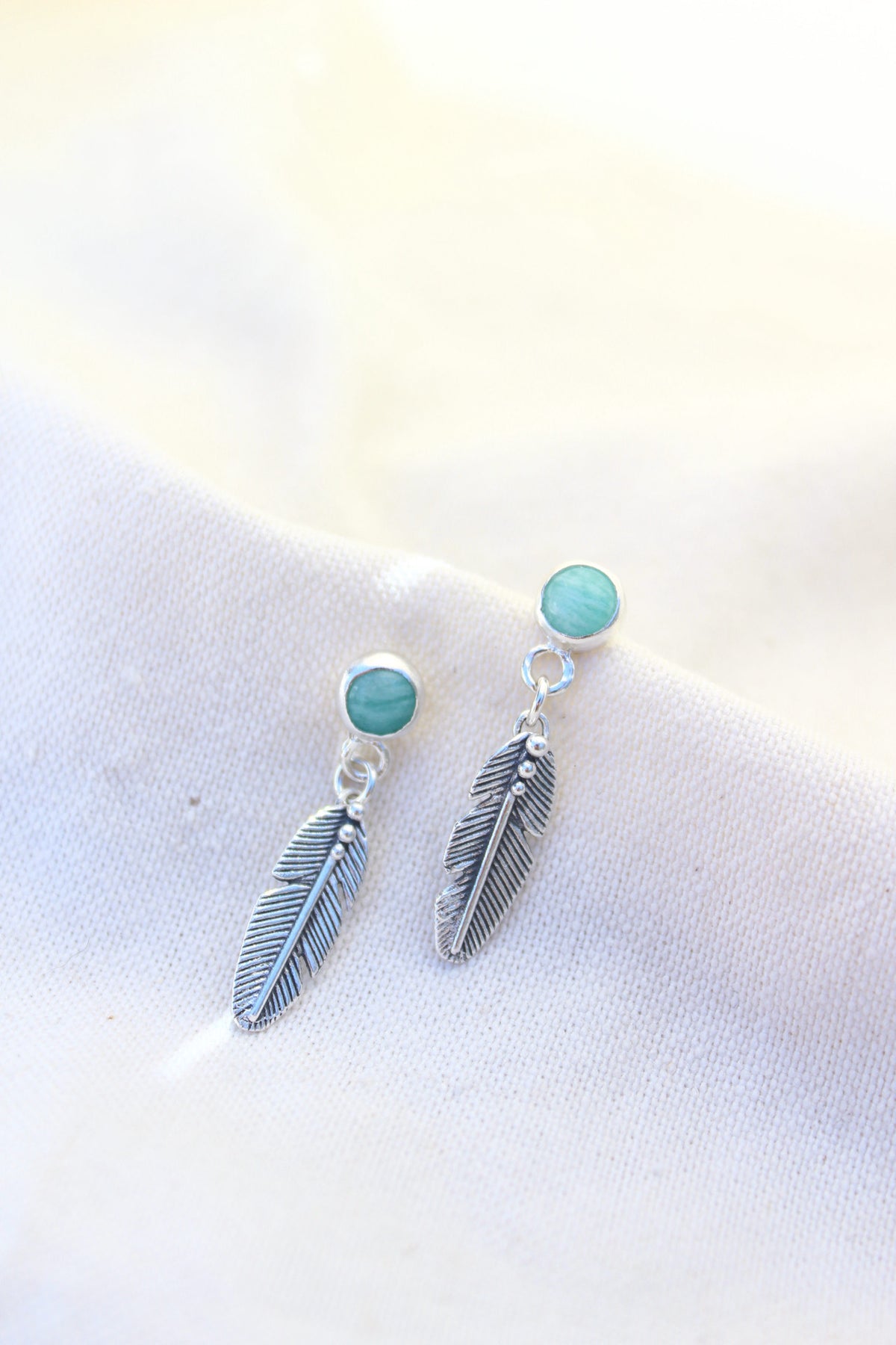 Conjunto collar águila sagrada + aros pluma Amazonita