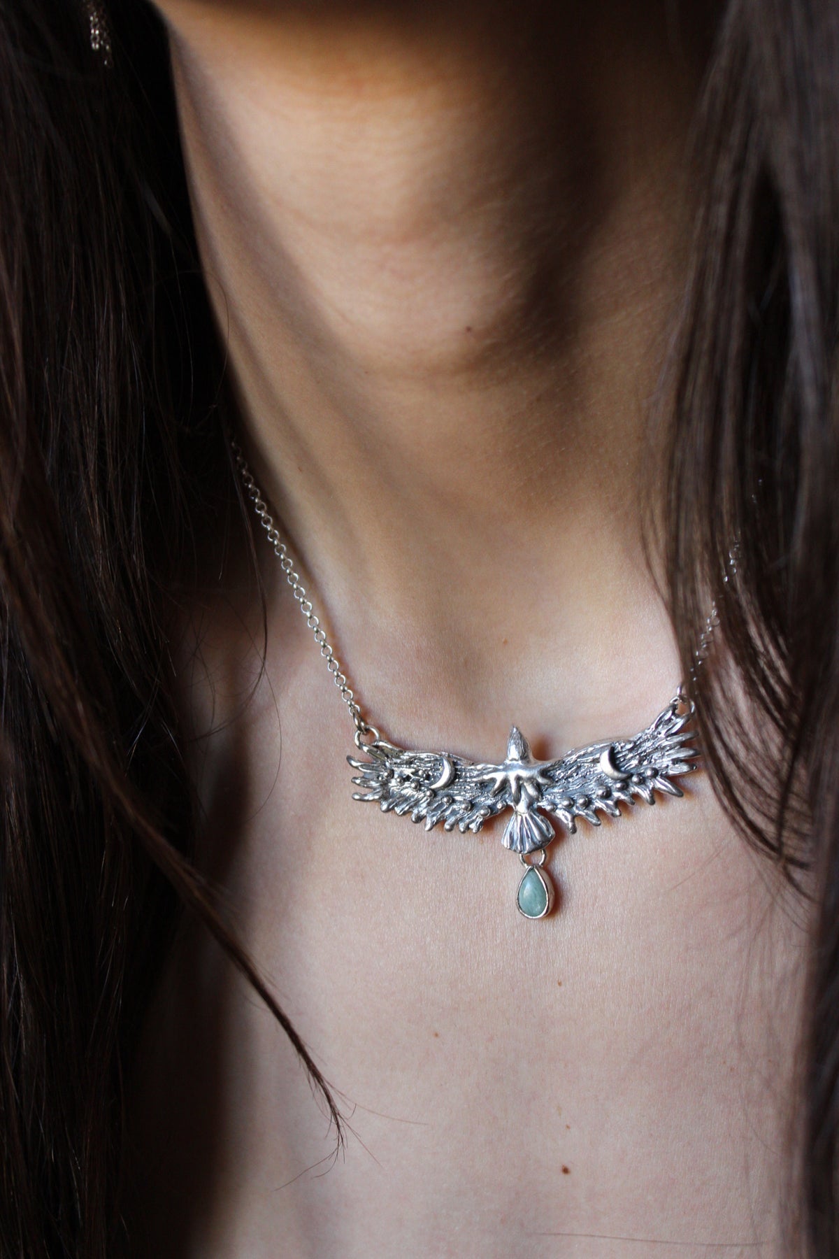 Collar águila guía