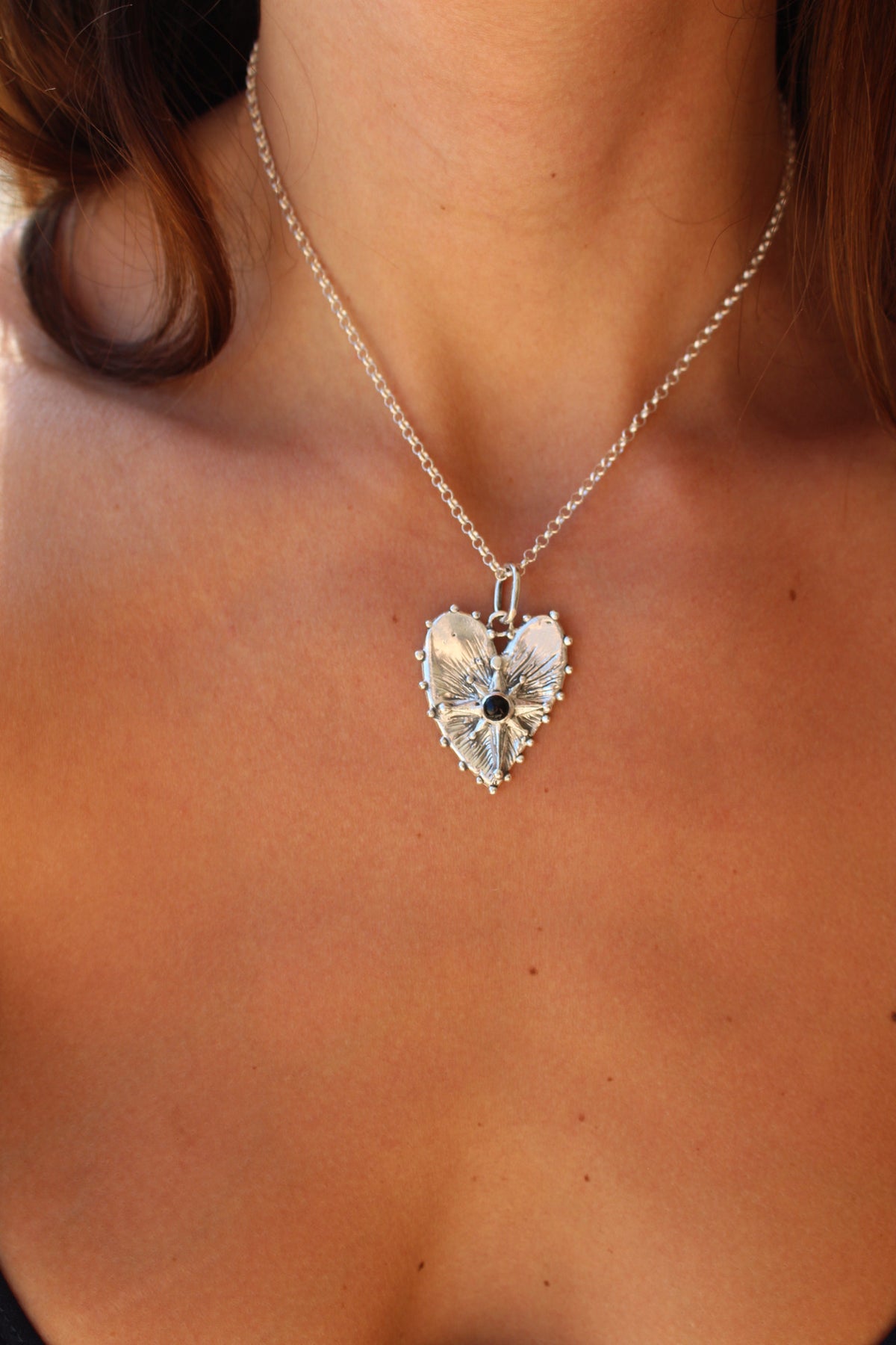 Corazón guía ónix negro