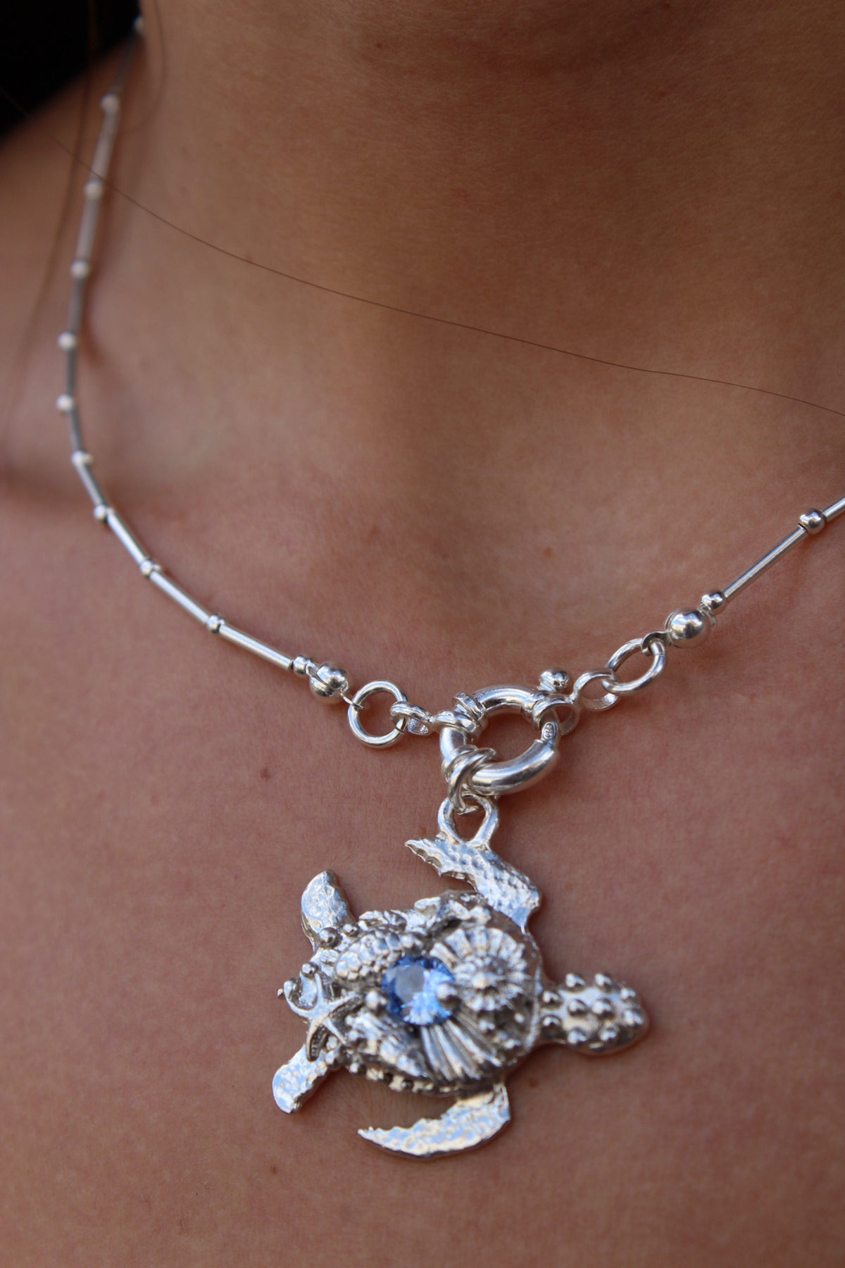 Tortu mommy con cristal azul