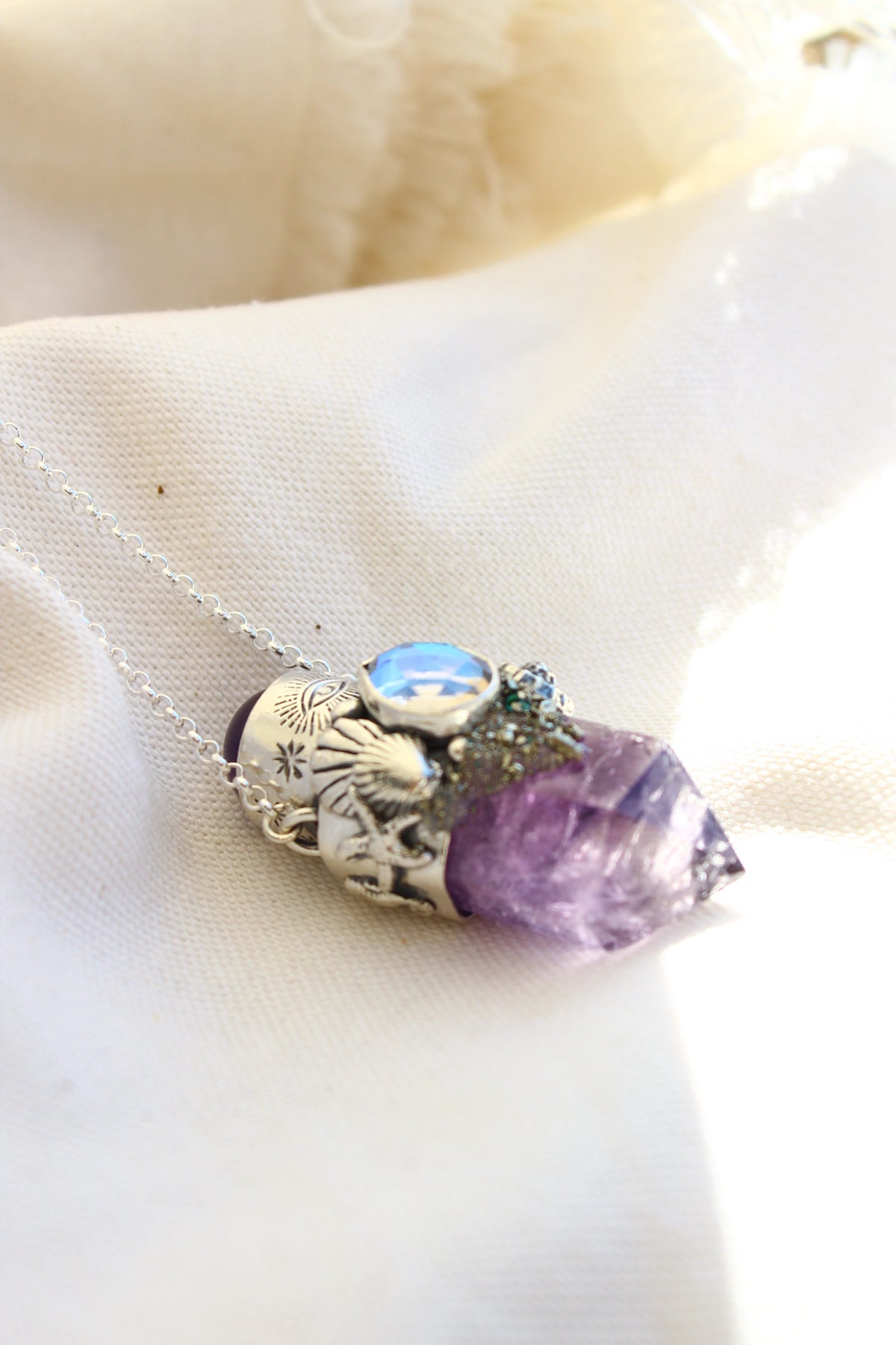 Amuleto Atlantis Ojo protector estrellado de mar