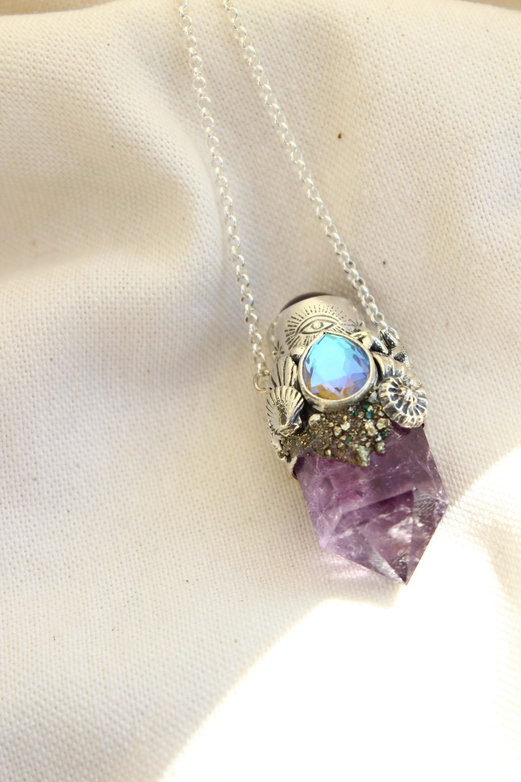 Amuleto Atlantis Ojo protector estrellado de mar