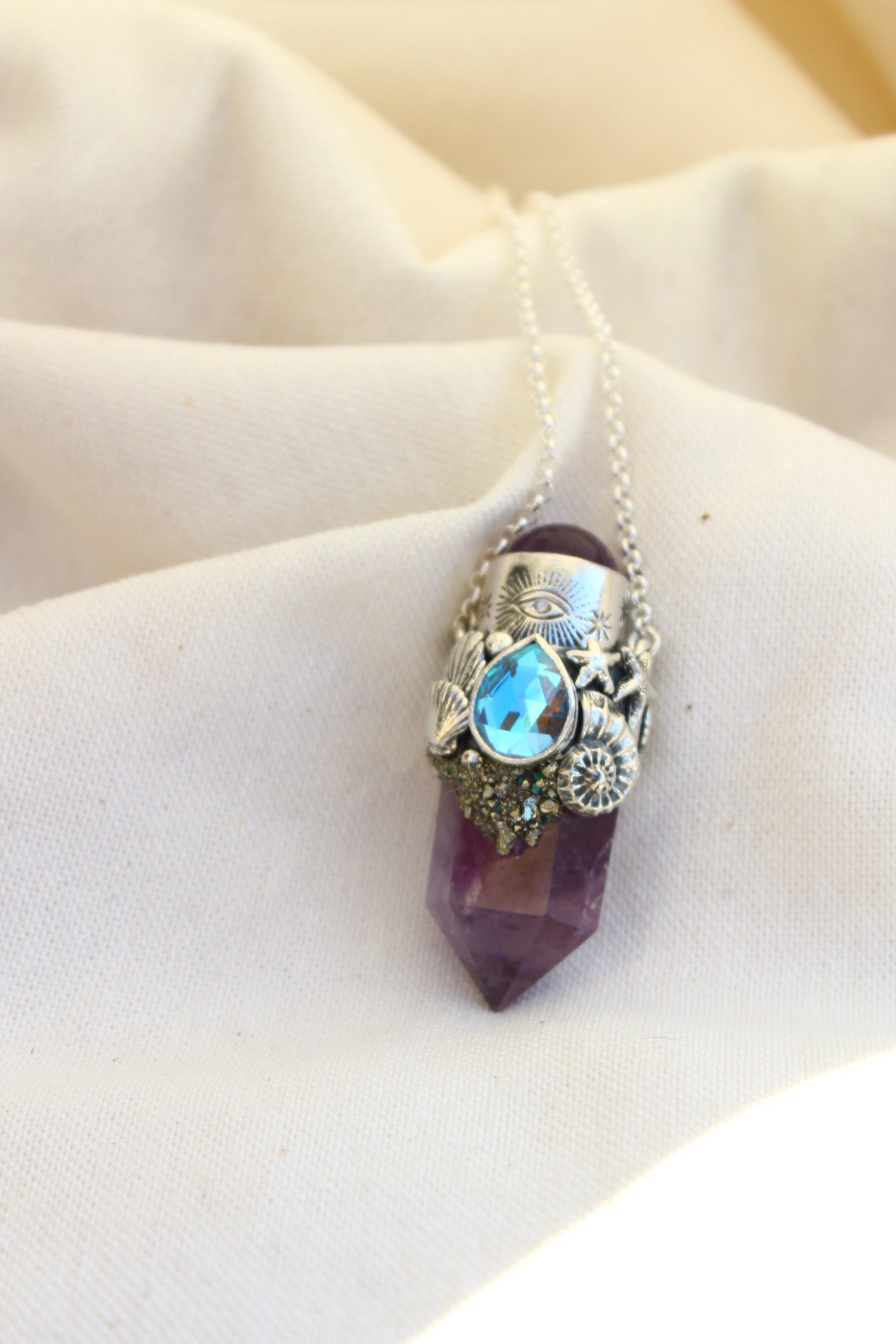 Amuleto Atlantis Ojo protector estrellado de mar